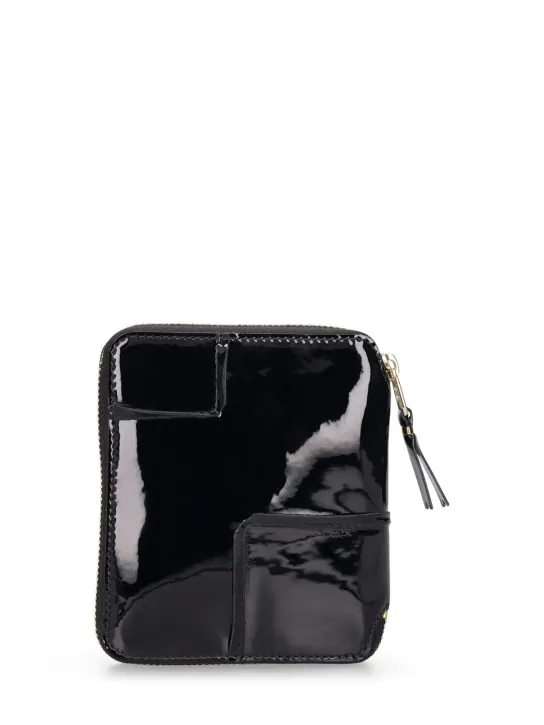 Comme des Garçons Wallet   Reversed Hem patent zip around wallet 